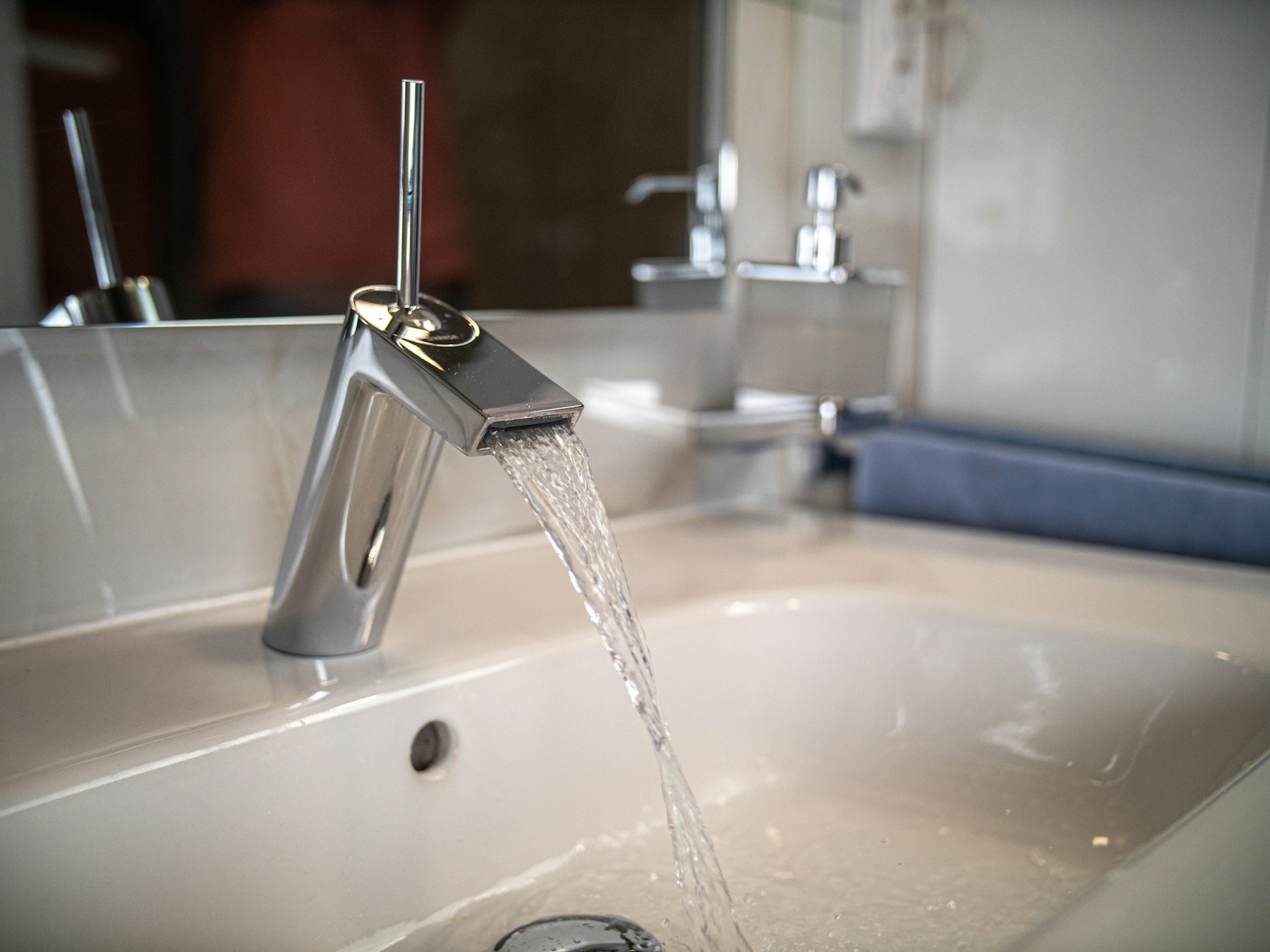 Water running from a chrome tap